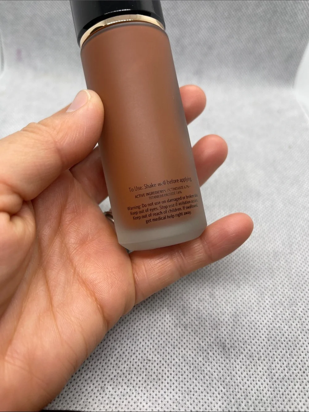 Bobbi Brown Weightless Skin Foundation - Warm Tan Bottle